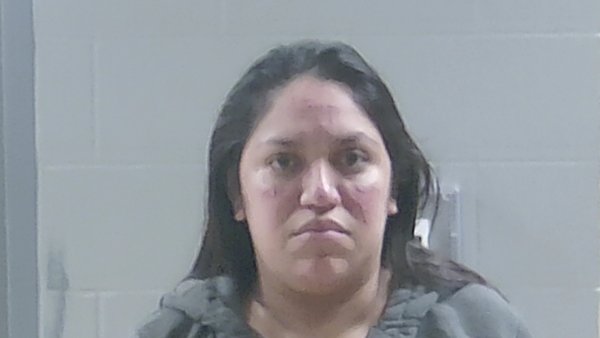 Mugshot of CINDY OSIRIS DOMINGUEZ LARIOS