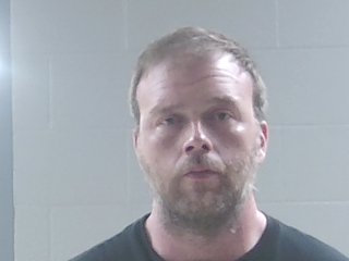 Mugshot of DANIEL BECKER