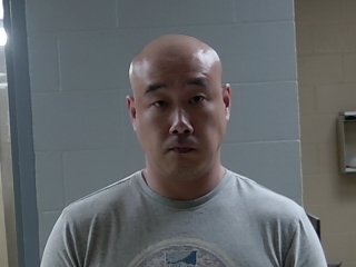 Mugshot of SHENGJIE CHENG