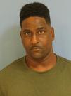 Mugshot of ROMERO ROUSER