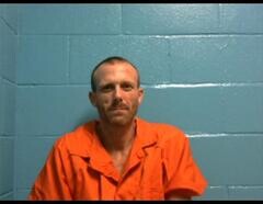 Mugshot of TRAVIS A YATES