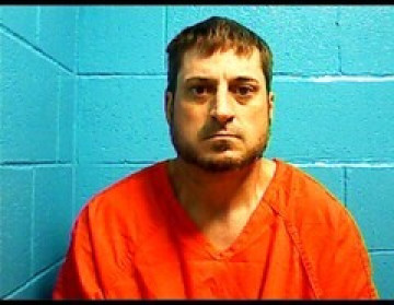 Mugshot of CHESTER A SIMPSON