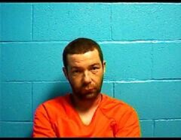 Mugshot of AUSTIN J THERIOT