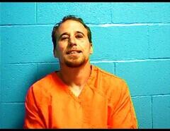 Mugshot of TRAVIS L GILMORE