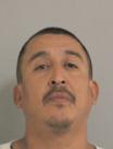 Mugshot of REYNALDO JR LEAL