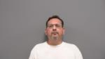 Mugshot of Oscar Godina