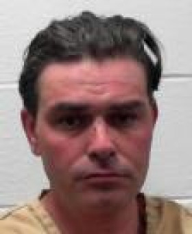 Mugshot of JONATHAN DALE BREWSTER