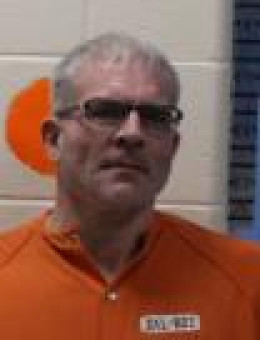 Mugshot of JOHN CECIL FLANNERY