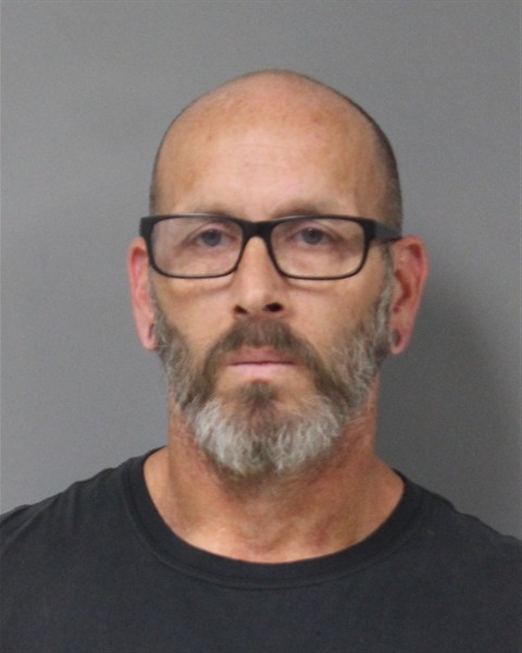 Mugshot of JUSTIN ROSS BENJAMIN