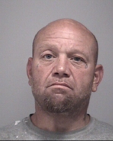 Mugshot of JOHN WESLEY HOWELL