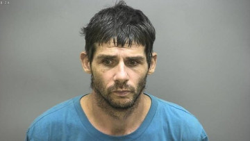 Mugshot of RYAN LEE HUGHES