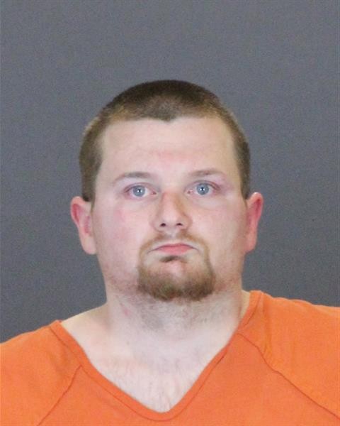 Mugshot of JUSTIN ALEXANDER GRAVETT