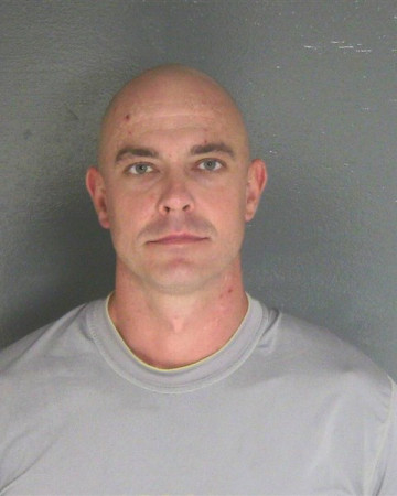 Mugshot of JUSTIN C SHERBURN