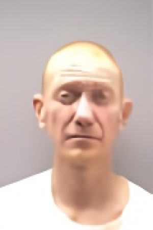 Mugshot of ZACHARY DOUGLAS THOMPSON