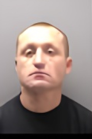 Mugshot of TREVOR DILLON HARRIS