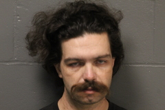 Mugshot of John Lewis Gregory