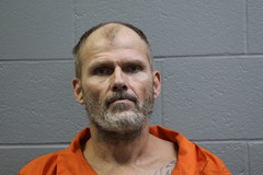 Mugshot of Marion Eugene Ray