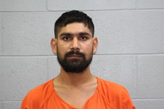 Mugshot of Aman Aman Aman