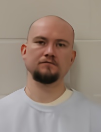 Mugshot of BRANDON M WOODS