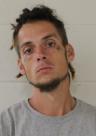 Mugshot of TREVOR L HOLSTROM