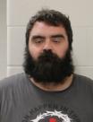 Mugshot of ETHAN L KELLOGG
