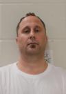 Mugshot of RYAN M COMBS
