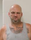 Mugshot of RUSSELL A MENSCH