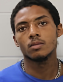 Mugshot of DEVON PULLUAIM