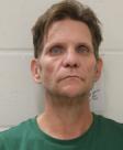 Mugshot of CHUCK M POWE