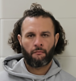 Mugshot of CHRISTIAN E TOLEDANO