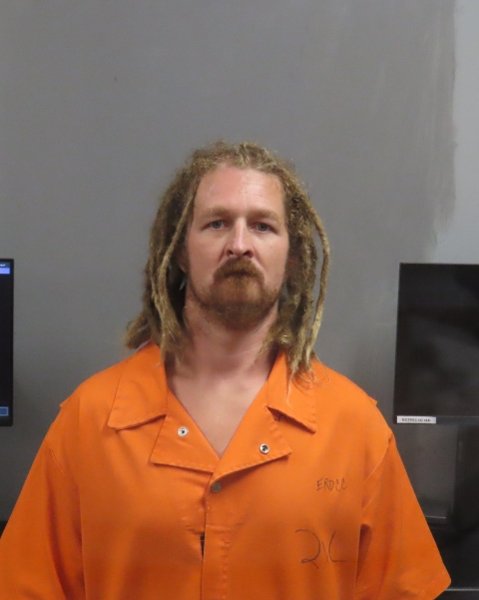 Mugshot of TRAVIS JOHN DEVORE