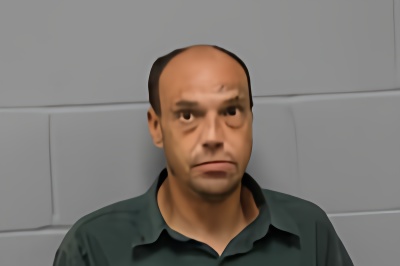 Mugshot of MICHAEL TRAVIS KALWEI