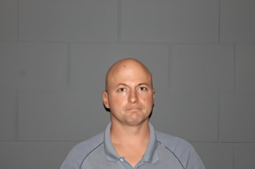Mugshot of CLAYTON BURKHART