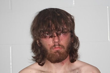 Mugshot of JONATHAN M MOORE