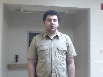 Mugshot of Matthew Levi Coons Reed