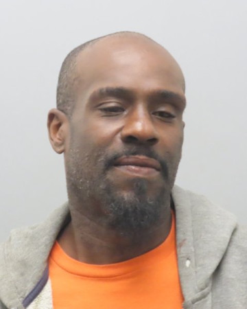 Mugshot of CLARENCE EARL J COOPER