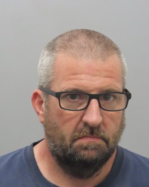Mugshot of DAVID JAMES COWAN