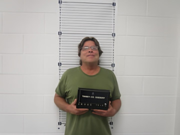 Mugshot of MICHAEL J SWEET