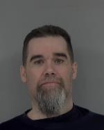 Mugshot of Adam Joseph Skoog