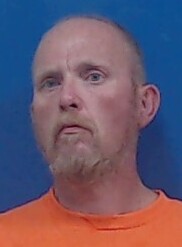Mugshot of THOMAS HOWLAND