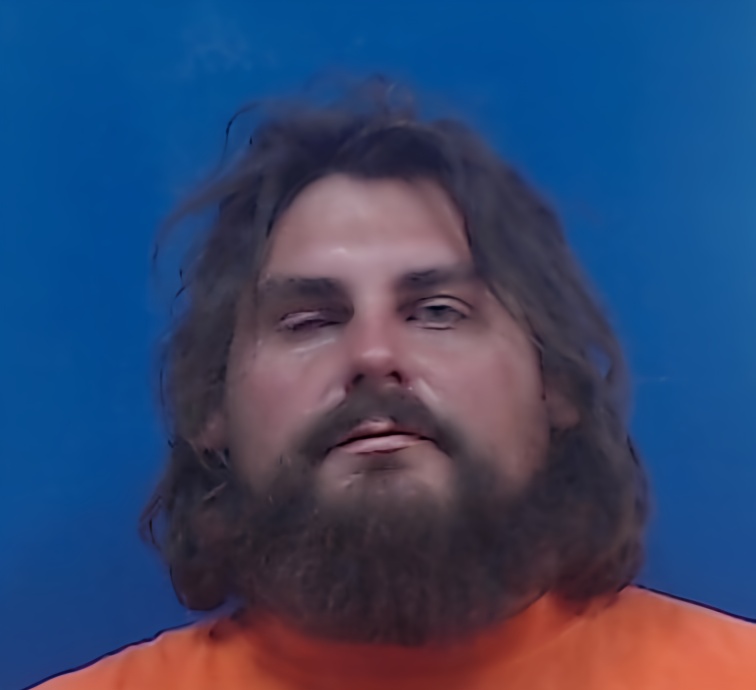Mugshot of JUSTIN ERKHART