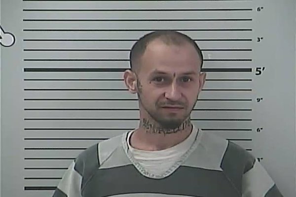 Mugshot of MICHAEL DALE POYADOU