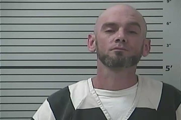 Mugshot of THOMAS ALEXANDER RHODE