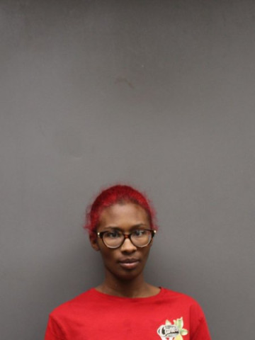 Mugshot of DAMIA IMAN HUGHES