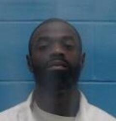Mugshot of BYRON REYNOLDS