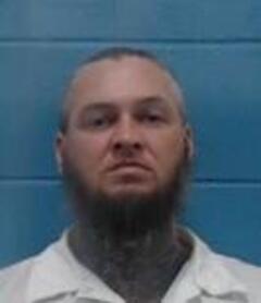 Mugshot of JARON C KNUE