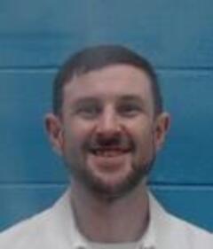 Mugshot of JUSTIN K WILLIAMS