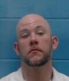 Mugshot of TIMOTHY O HOWARD