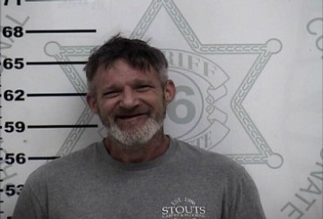 Mugshot of ROBERT E LEE RAINES