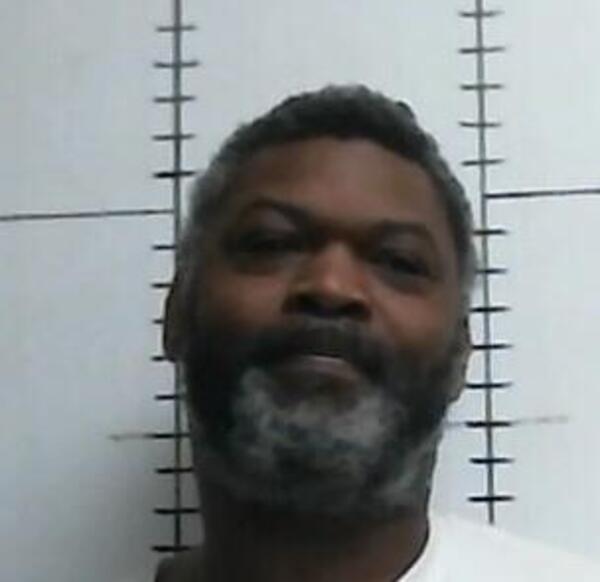 Mugshot of ROLAND R CARRUTHERS
